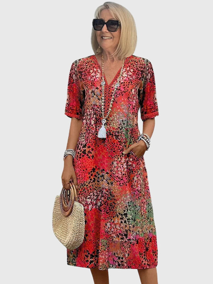 Bella Elegante Midi Jurk met Bloemenprint