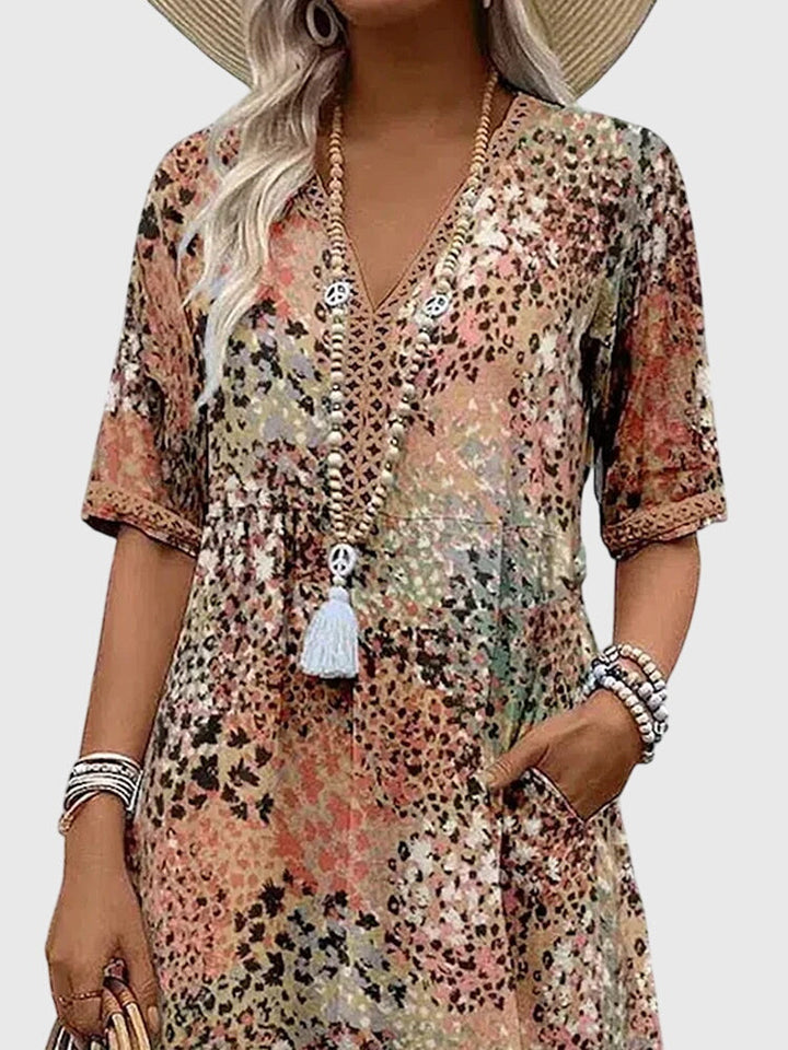 Bella Elegante Midi Jurk met Bloemenprint