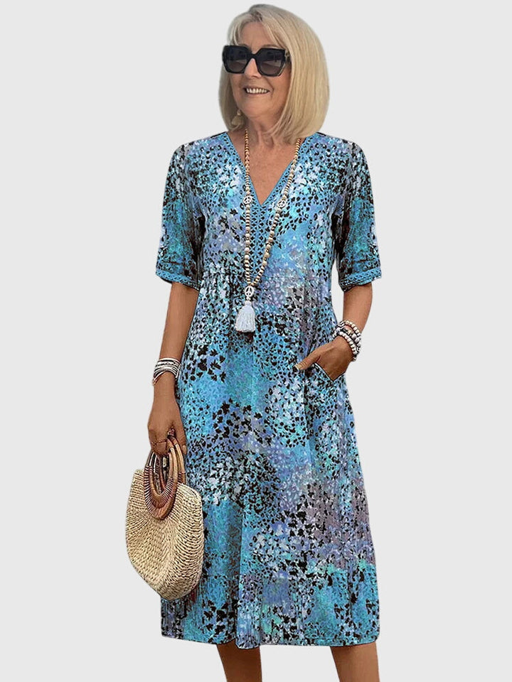 Bella Elegante Midi Jurk met Bloemenprint