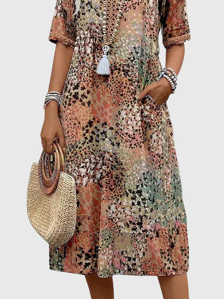 Bella Elegante Midi Jurk met Bloemenprint