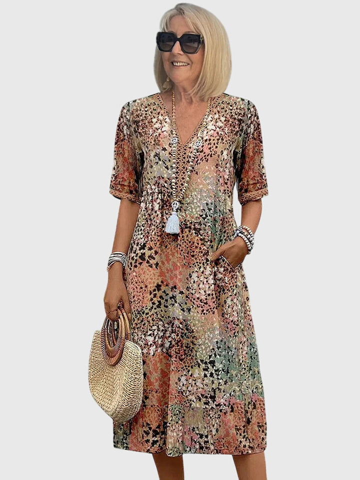 Bella Elegante Midi Jurk met Bloemenprint