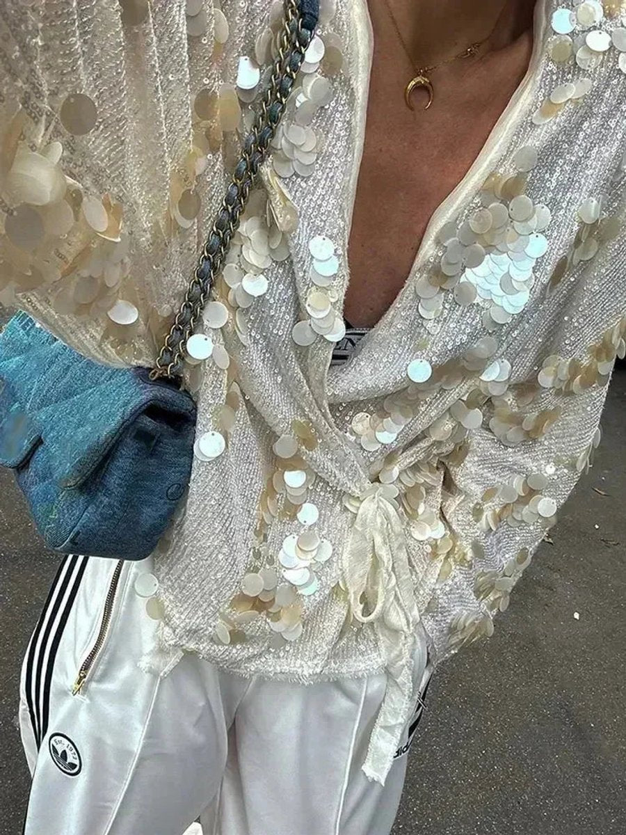 Mia Lange Pailletten Blouse met Wikkeldetail