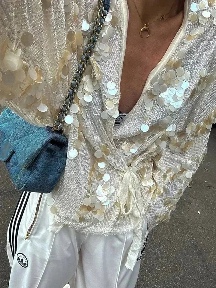 Mia Lange Pailletten Blouse met Wikkeldetail