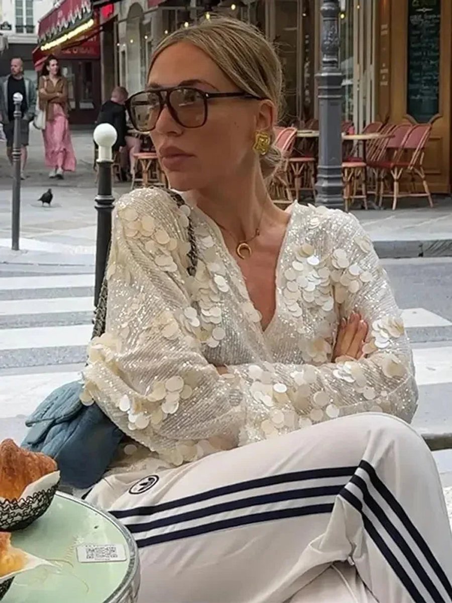 Mia Lange Pailletten Blouse met Wikkeldetail