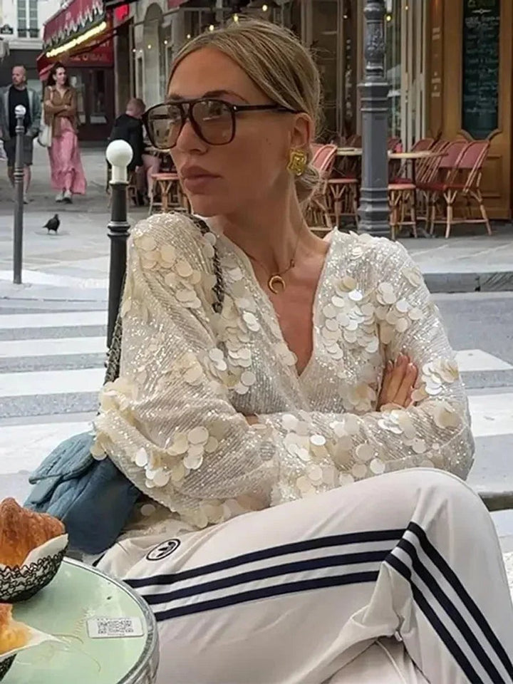 Mia Lange Pailletten Blouse met Wikkeldetail