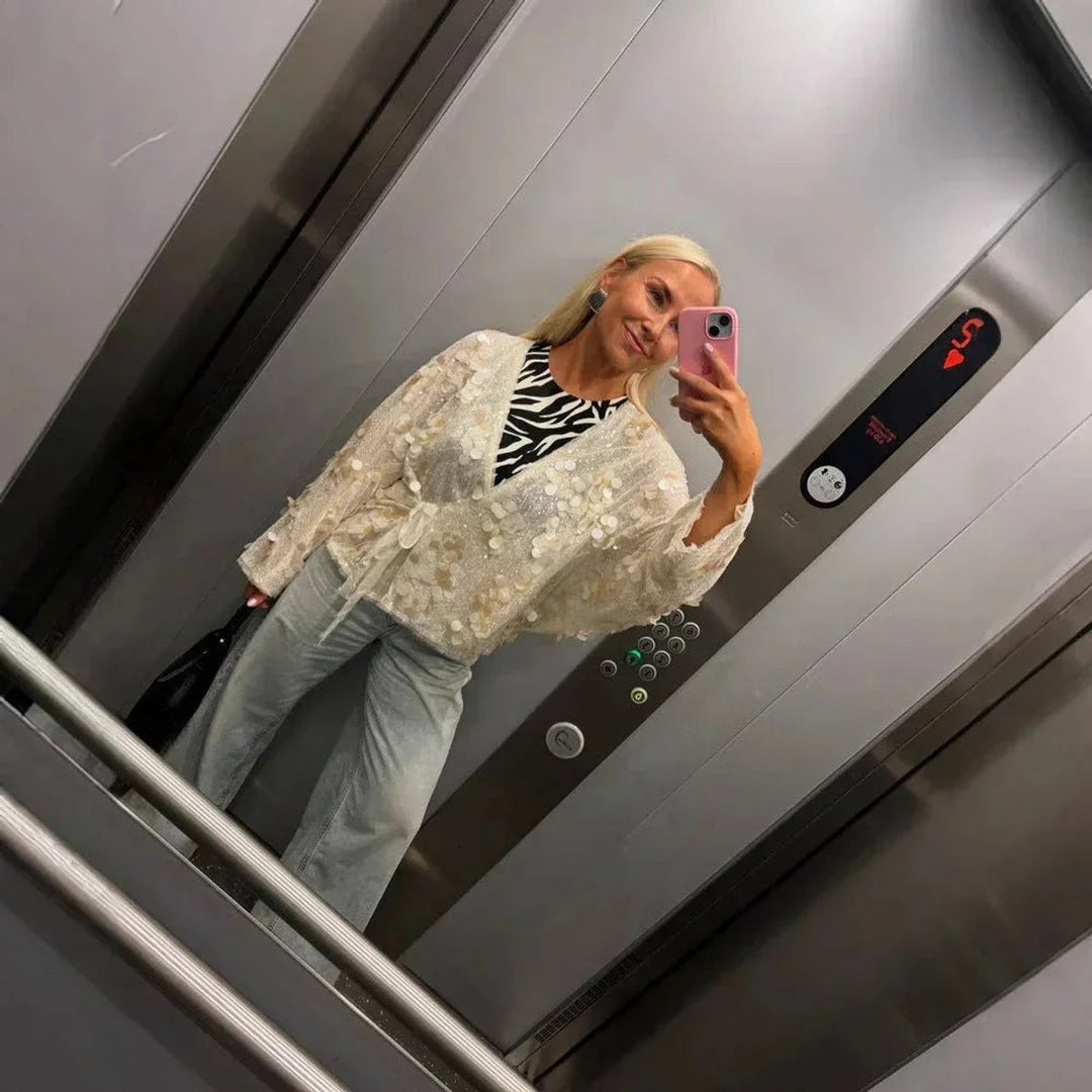 Mia Lange Pailletten Blouse met Wikkeldetail