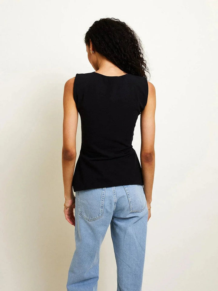 Rosie Blouse met Open Rug